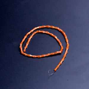 colored shell-reddish orange  bamboo shape 4x7mm