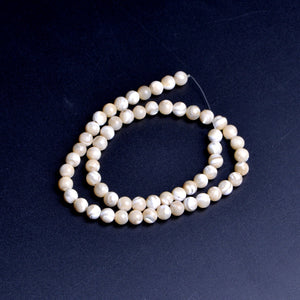 natural mop round bead 7mm